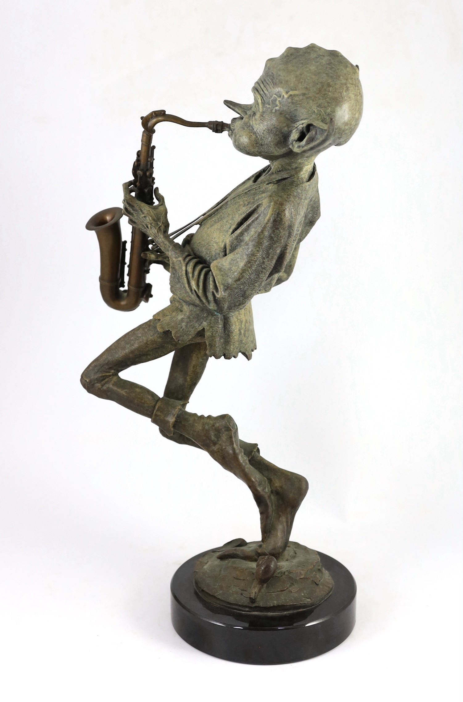 David Goode (British, b.1966). A bronze of a pixie saxophone player, height 61cm